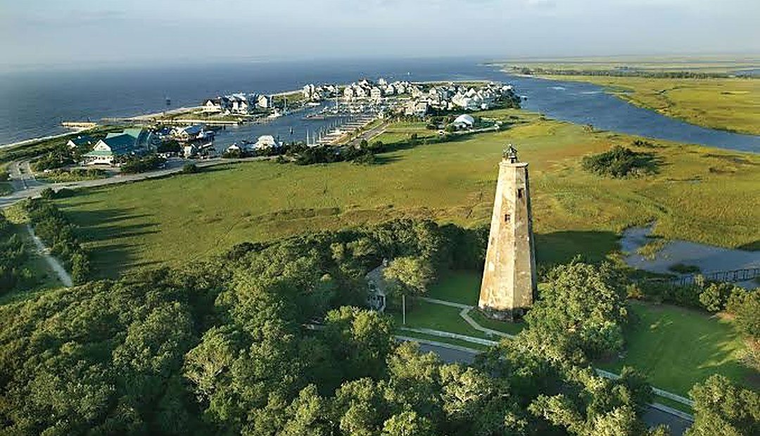 North Carolina coastal lighthouse and marshland, representing North Carolina down payment assistance programs